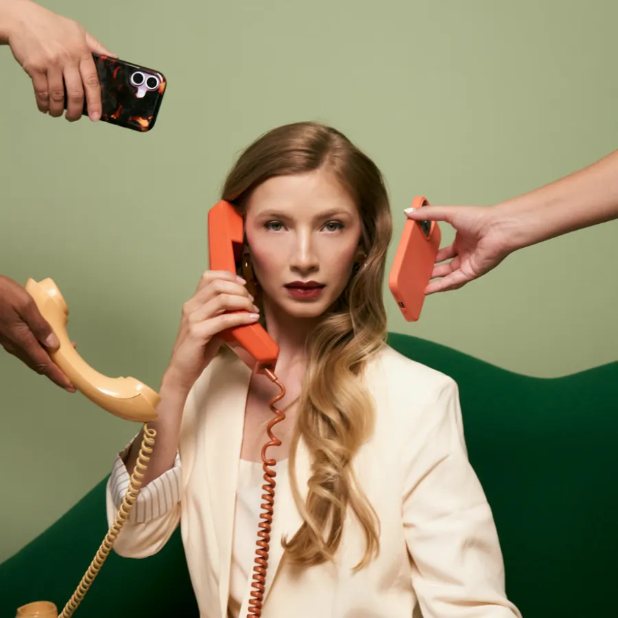 Event coordinator handling logistics by phone
